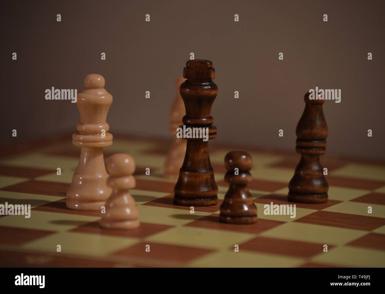 Chess board with figures, checkmate white wins Stock Photo