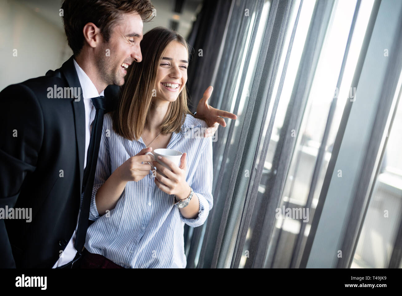 Young loving happy couple have fun smiling and talking Stock Photo