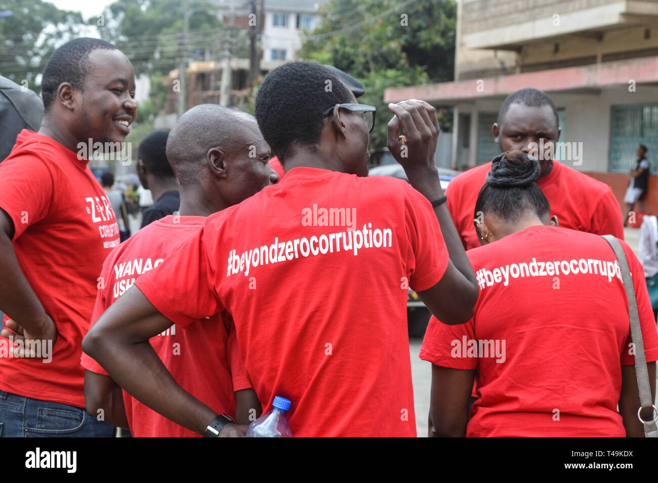 Nakuru, Rift Valley, Kenya. 14th Apr, 2019. A group of activists allied to Kenya's Red Vests Movement are seen discussing after a church service.Activists allied to Kenya's Red Vests Movement were protesting silently about increased levels of corruption in the government, the activists are demanding action to be taken against all government officials involved in corruption. Credit: ZUMA Press, Inc./Alamy Live News Stock Photo
