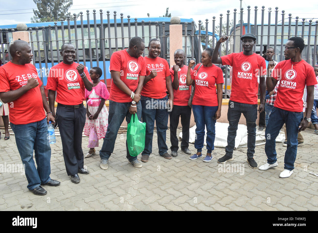 Nakuru, Rift Valley, Kenya. 14th Apr, 2019. A group of activists allied to Kenya's Red Vests Movement are seen posing for a photo after a church service.Activists allied to Kenya's Red Vests Movement were protesting silently about increased levels of corruption in the government, the activists are demanding action to be taken against all government officials involved in corruption. Credit: ZUMA Press, Inc./Alamy Live News Stock Photo
