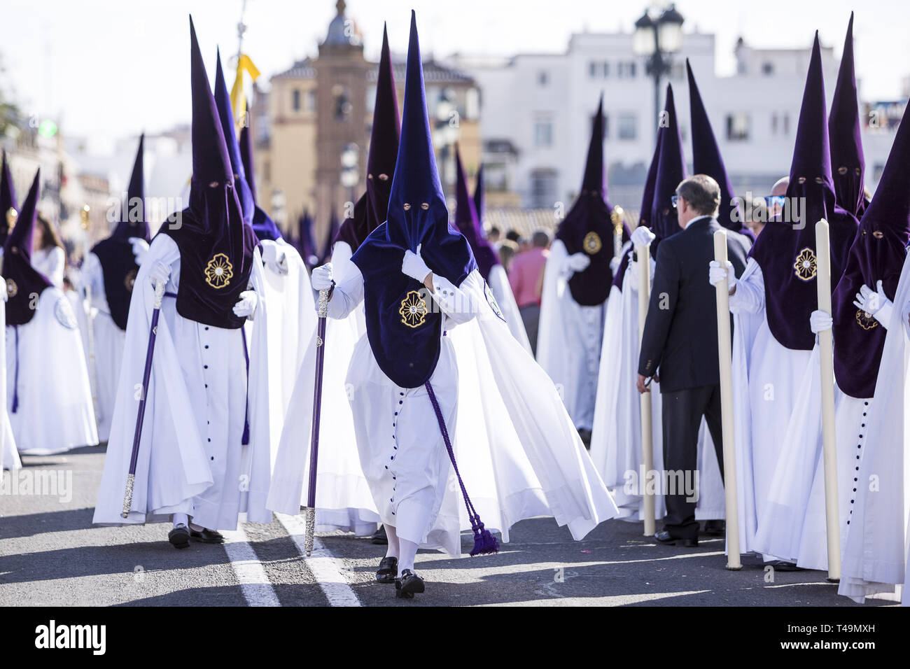 Seville, Spain. 14th Apr, 2019. Penitents of the Brotherhood called ''La  Estrella'' during their parade to Cathedral on Palm Sunday, day called  Domingo de Ramos. Credit: Daniel Gonzalez Acuna/ZUMA Wire/Alamy Live News