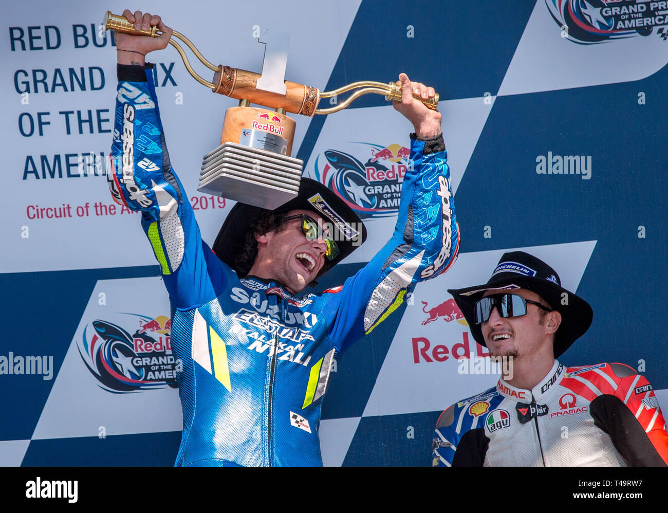 Austin, Texas, USA. 14th Apr, 2019. 3rd Place JACK MILLER (right) watches  as 1st place ALEX RINS celebrates with the winner's trophy after the MotoGP  Red Bull Grand Prix of the Americas