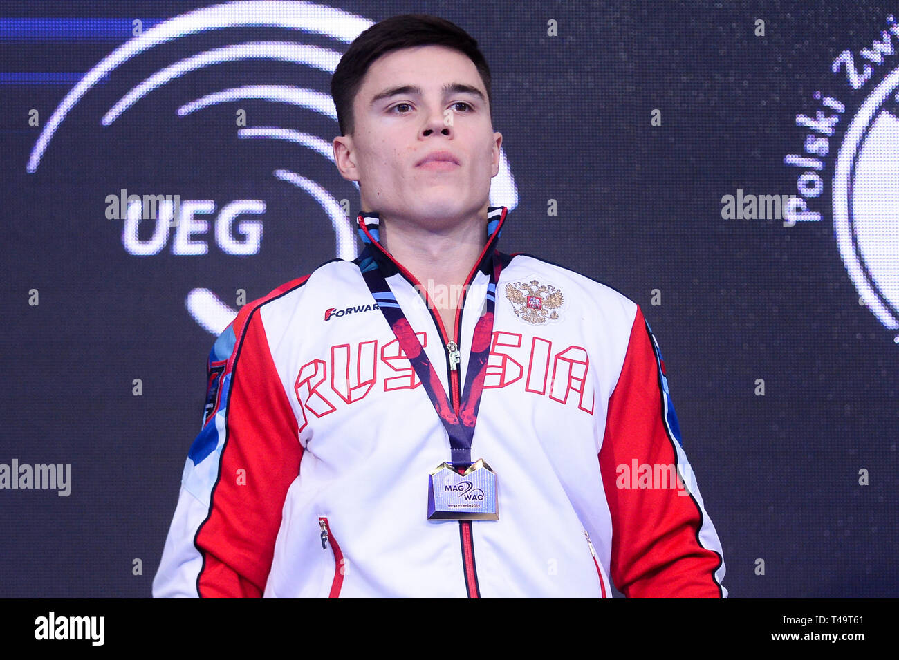 nikita-nagornyy-from-russia-seen-with-a-gold-medal-of-the-parallel-bars