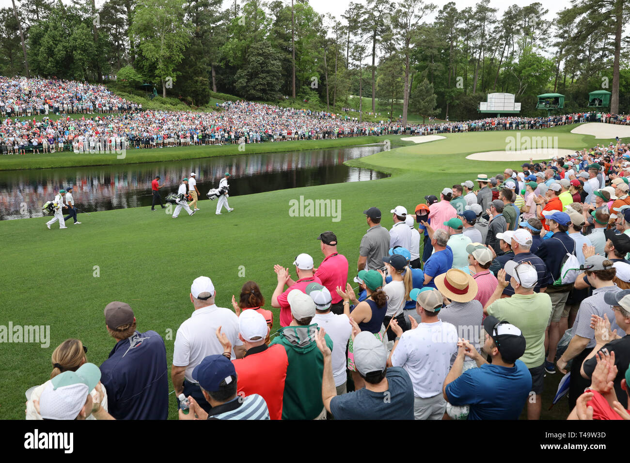 Augusta, USA. 14th Apr 2019. Tiger Woods (USA) walks on the 16th hole  during the final round of the 2019 Masters golf tournament at the Augusta  National Golf Club in Augusta, Georgia,
