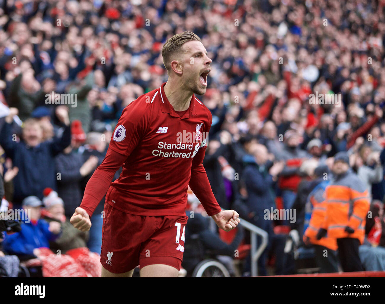 Liverpool. 15th Apr, 2019. Liverpool's Jordan Henderson celebrates team's goal during English Premier League match between Liverpool FC and Chelsea FC at Anfield in Liverpool, Britain on April 14, 2019. Liverpool won 2-0. Credit: Xinhua/Alamy Live News Stock Photo
