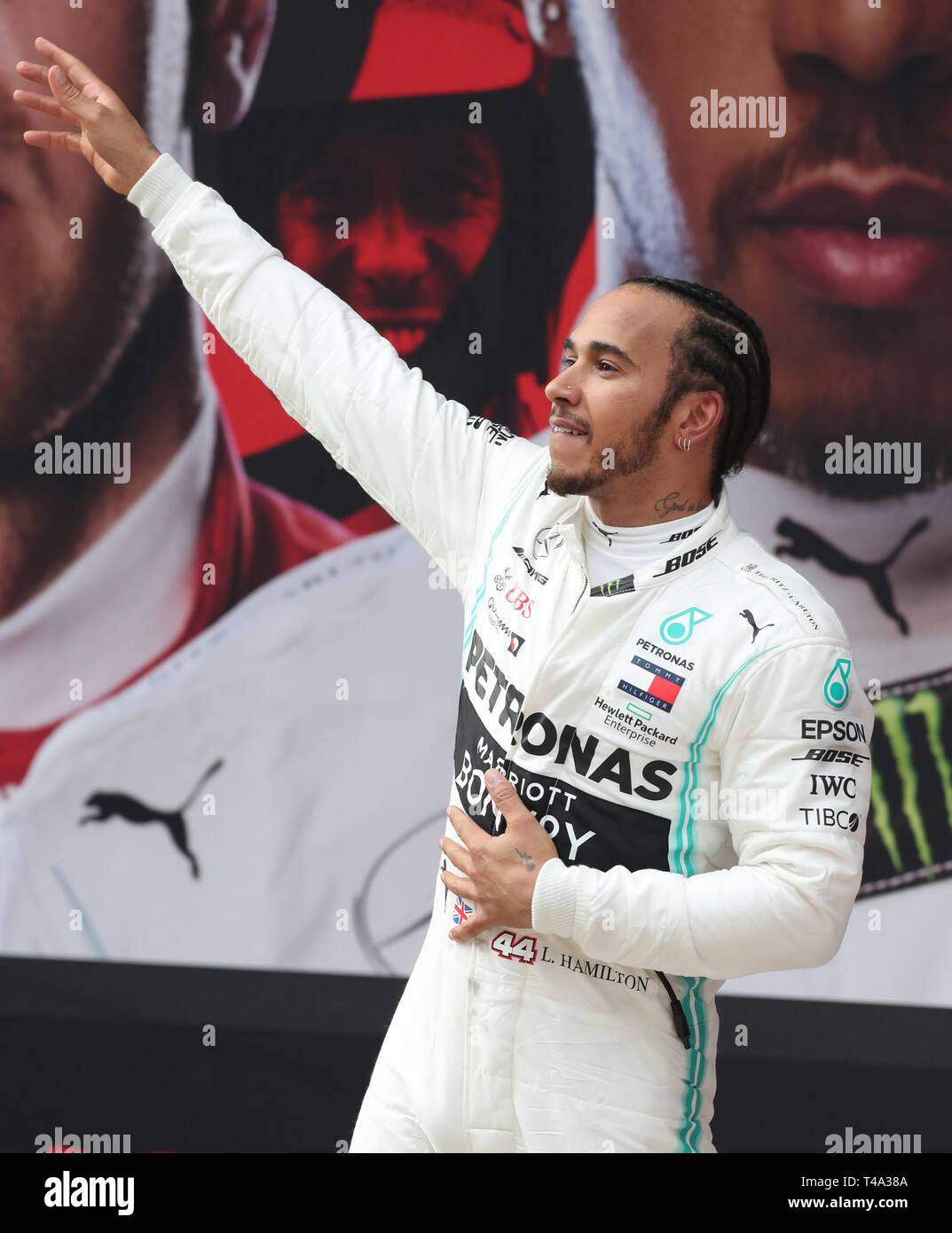 Shanghai, China. 14th Apr, 2019. Mercedes driver Lewis Hamilton of Britain celebrates after the Formula One Chinese Grand Prix in Shanghai, China, on April 14, 2019. Credit: Ding Ting/Xinhua/Alamy Live News Stock Photo