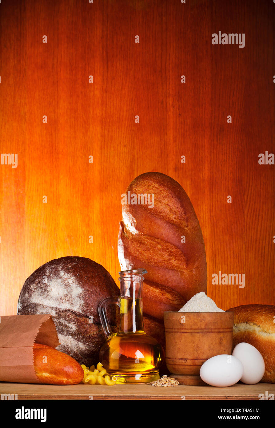 Bread assortment with baking ingredients Stock Photo