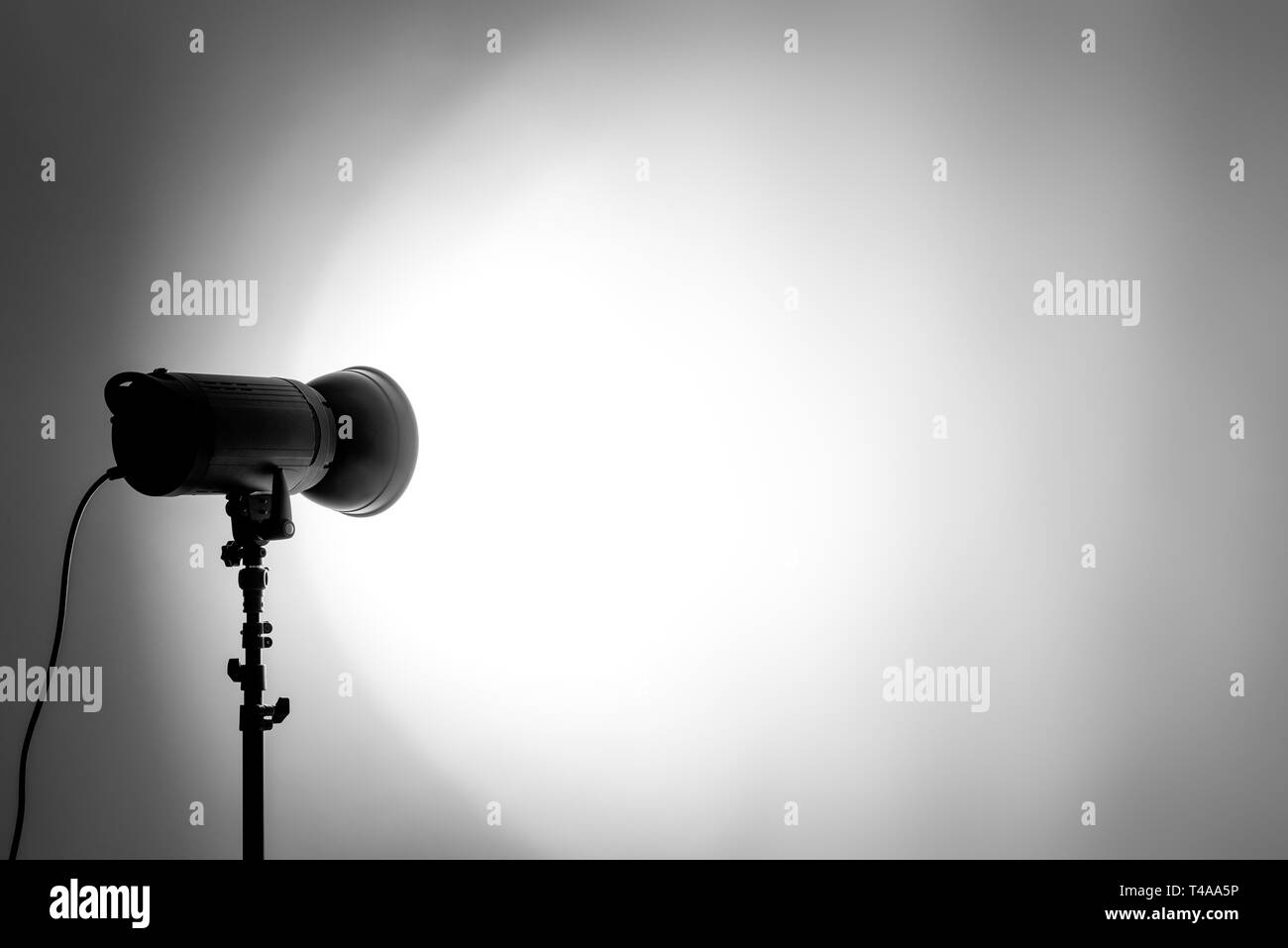 studio equipment flash shines on a white paper background Stock Photo ...