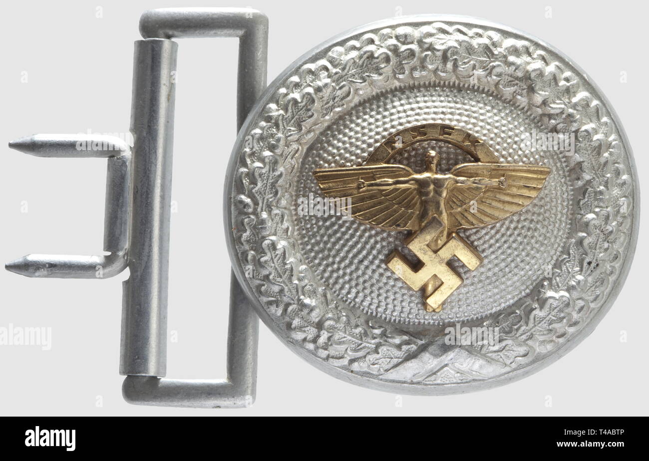A brocade belt buckle for NSFK leaders, Oval aluminium belt buckle with riveted, gilt NSFK eagle, maker 'RZM M4/24/4'. 50 mm x 60 mm. Of extreme rarity. One of the rarest belt buckles of the Third Reich, historic, historical, 1930s, 1930s, 20th century, organisation, organization, organizations, organisations, object, objects, stills, clipping, clippings, cut out, cut-out, cut-outs, NS, National Socialism, Nazism, Third Reich, German Reich, Germany, National Socialist, Nazi, Nazi period, insignia, Editorial-Use-Only Stock Photo