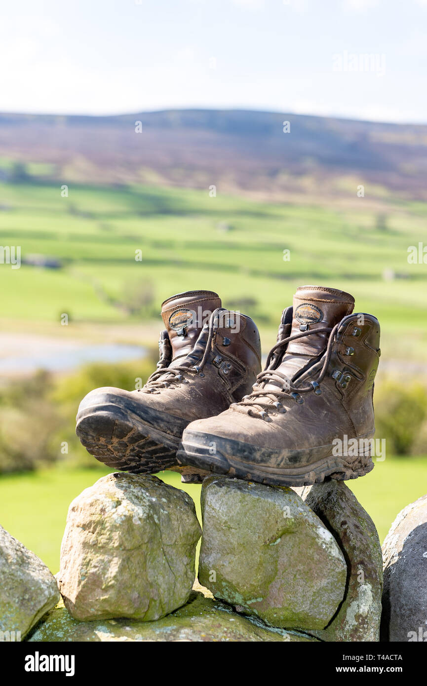 Muddy old walking boots hi-res stock photography and images - Alamy