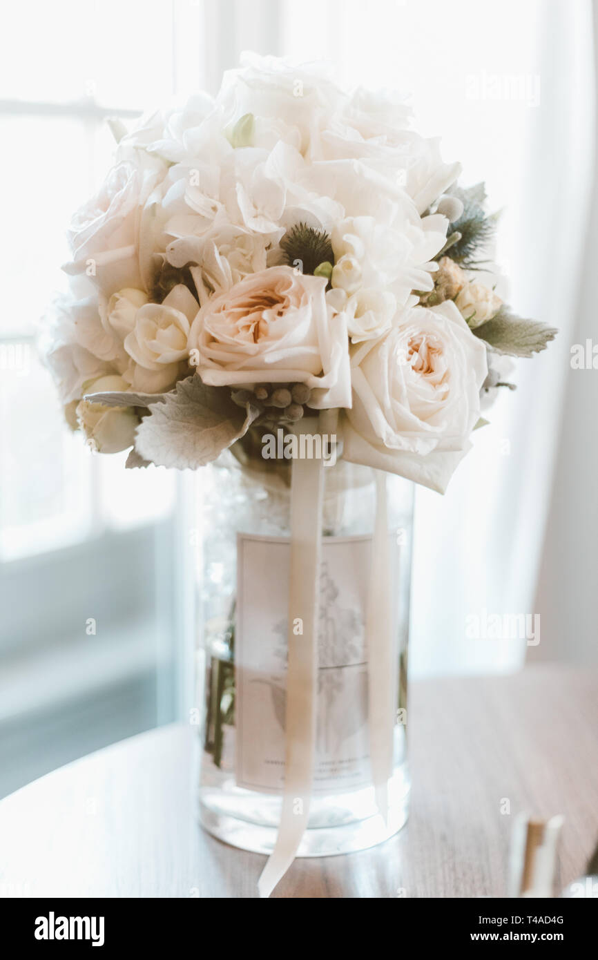 Bridal Bouquet In A Glass Vase With White Roses Stock Photo