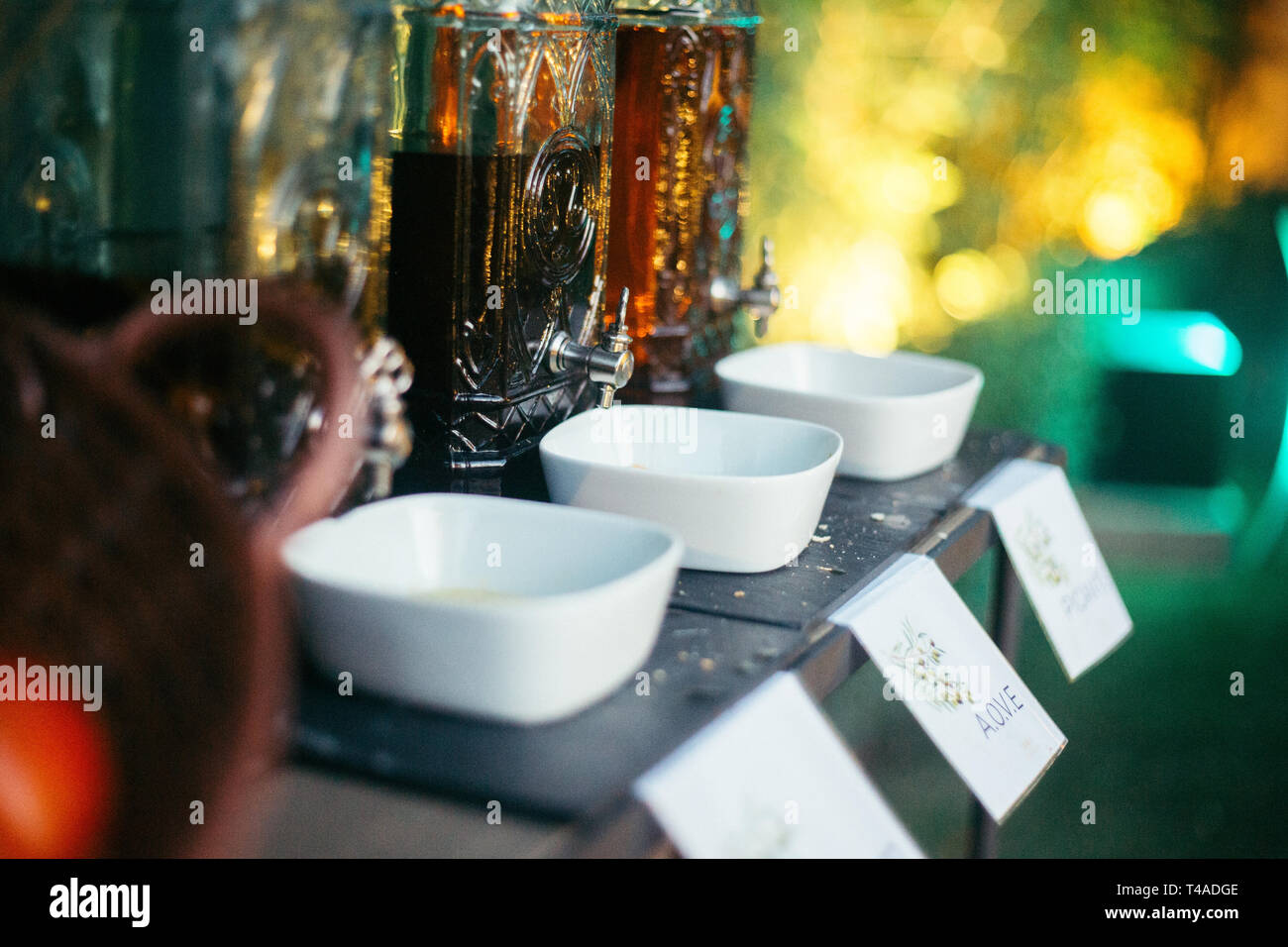 olive oil dispenser in outdoor catering Stock Photo Alamy