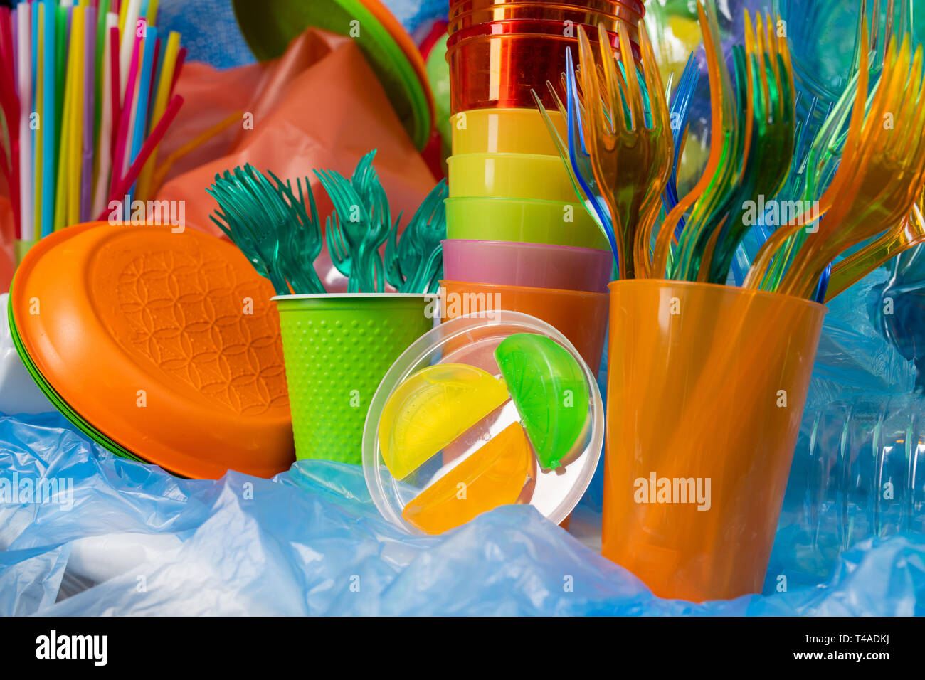 Disposable plastic cutlery of different sizes and textures Stock Photo