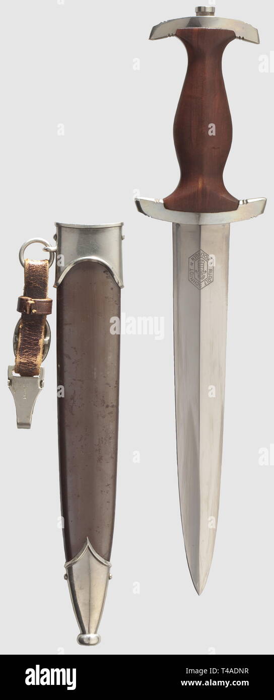 A model 1933 SA service dagger, with leather hanger, Maker Rudolf Schmidt, Solingen Beautiful blade with etched motto and maker's mark. Nickel silver grip fittings and brown wooden grip with inset nickel silver eagle and enamelled SA emblem. Burnished steel scabbard (light spotting) with nickel silver fittings. Brown leather hanger, the clip marked with Assmann-Logo. Length 34.5 cm, historic, historical, 1930s, 20th century, storm battalion, stormtroopers, armed and uniformed branch of the NSDAP, organisation, organization, organizations, organisations, NS, National Sociali, Editorial-Use-Only Stock Photo