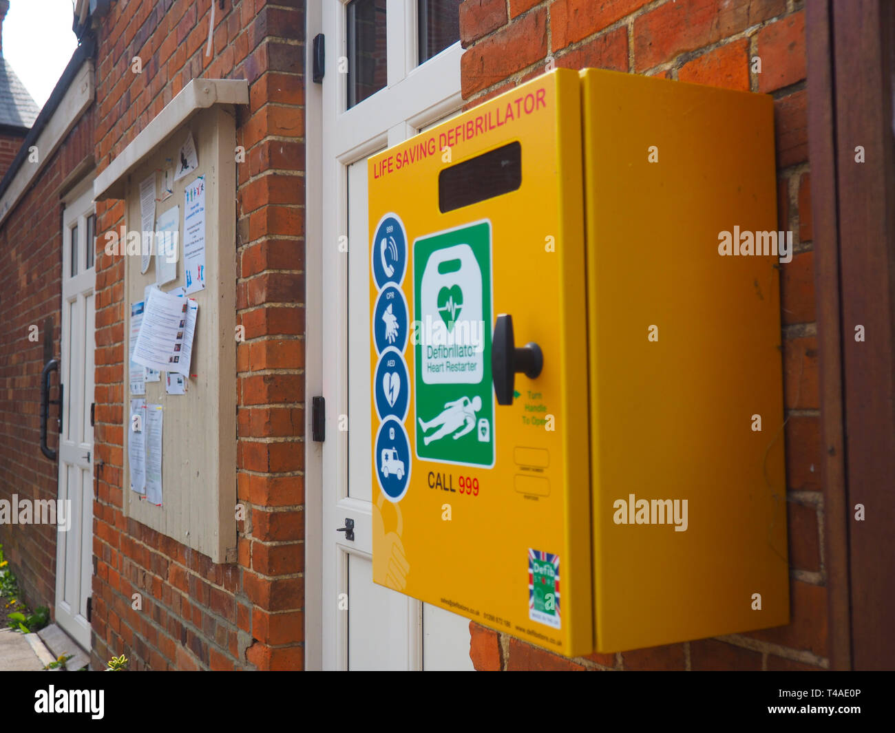 15th Apr 2019. Defibrillator at village hall in Forest Hill, Oxfordshire, UK. Stock Photo