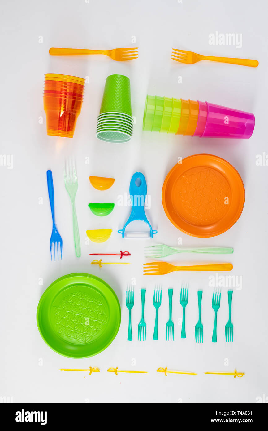 Kit of plastic utensils accurately placed on the floor Stock Photo Alamy