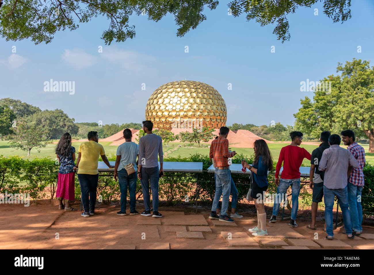 Horizontal view of tourists at the viewpoint for the Matrimandir in Auroville, India. Stock Photo