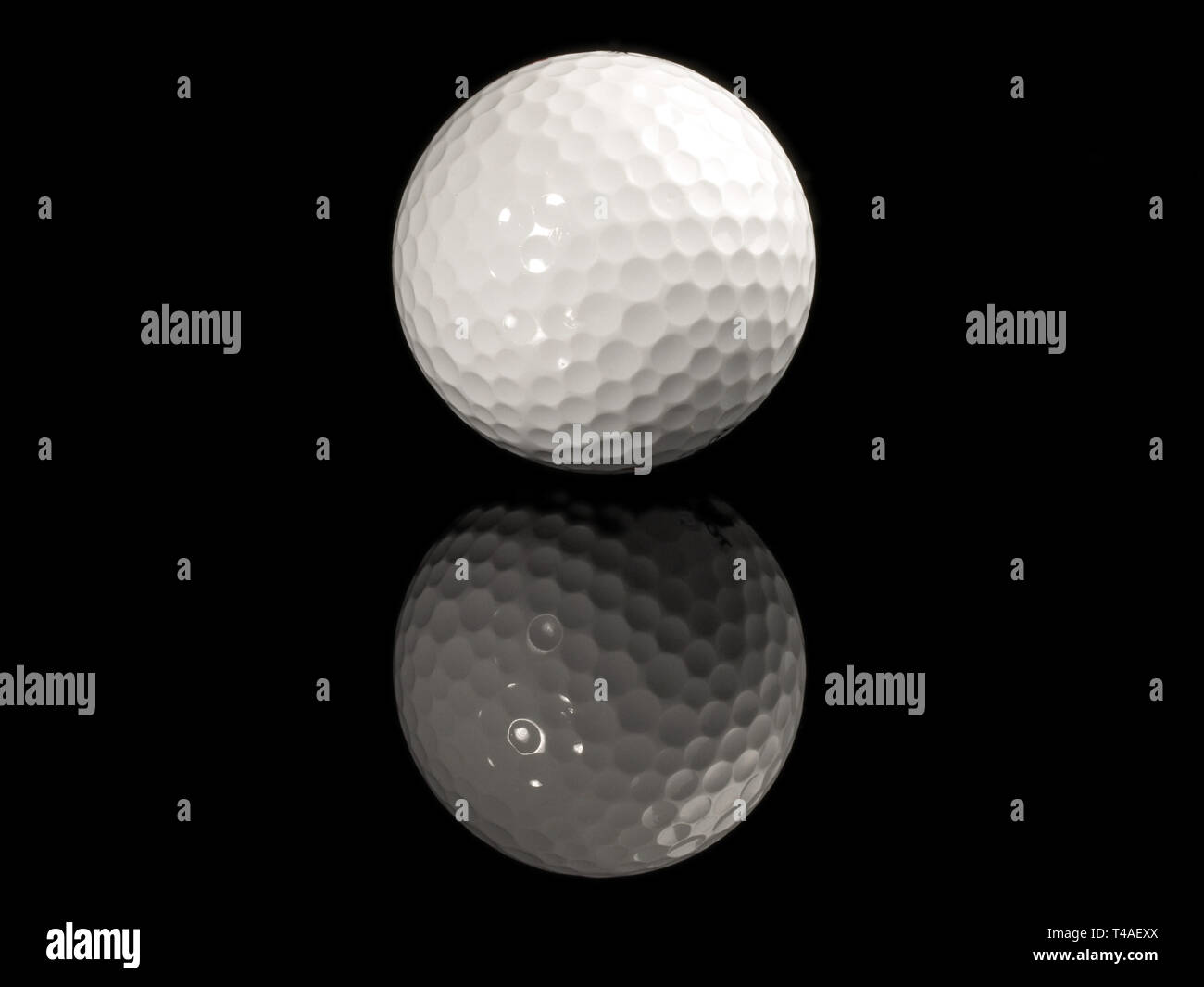 Golf Ball - Black Background Stock Photo - Alamy