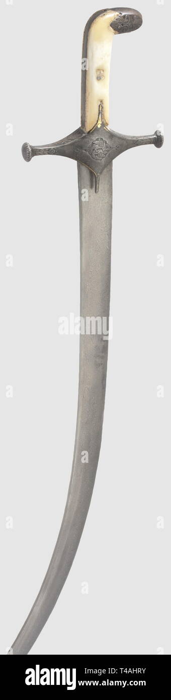 A Caucasian nielloed silver shashqa, dated 1889. Single-edged blade with several fullers on each side, a double-edged point, and remnants of decorative etching at the forte. Finely engraved and nielloed silver grip. Leather-covered wooden scabbard with silver mounts nielloed en suite. An owner's inscription and the year '1307' (= 1889) nielloed on the bottom of the locket. Appended short leather belt with nielloed fittings and a silver buckle. Length 97.5 cm, historic, historical, 19th century, Persian Empire, object, objects, stills, clipping, c, Additional-Rights-Clearance-Info-Not-Available Stock Photo