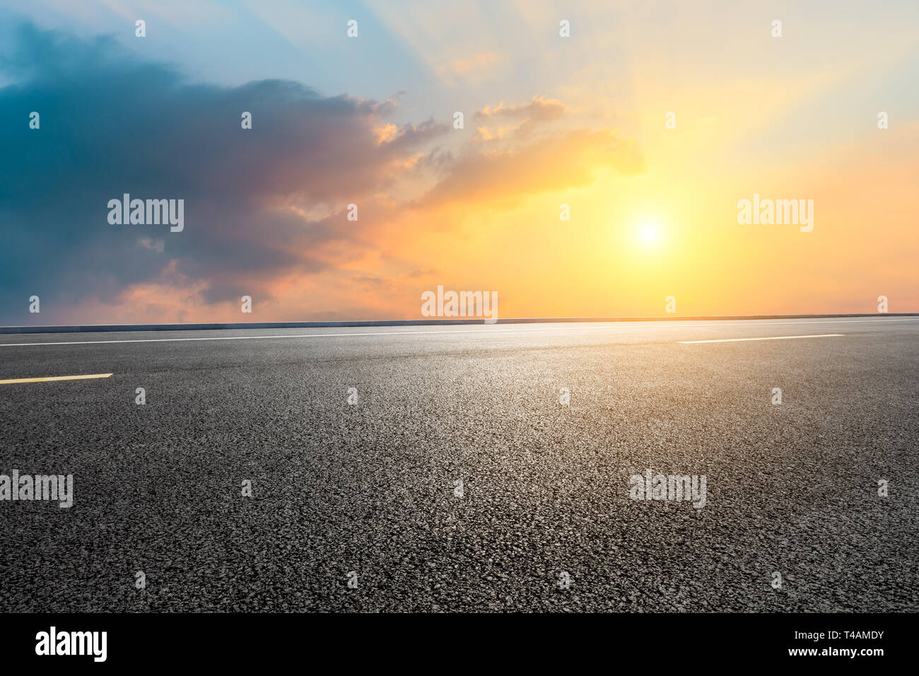 Empty asphalt road and beautiful sky clouds at sunset Stock Photo - Alamy