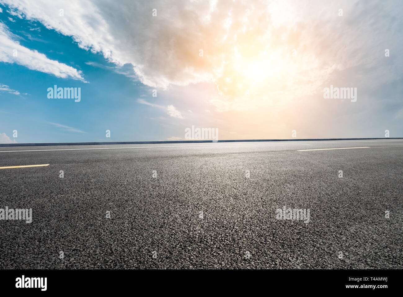 Empty asphalt road and beautiful sky clouds at sunset Stock Photo - Alamy