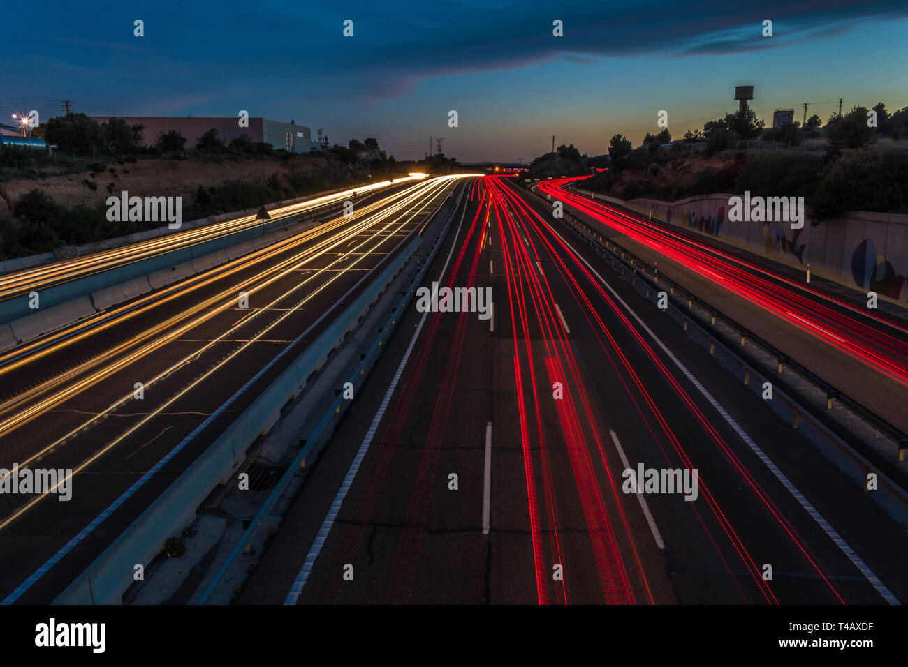 Light trails on the highway at night, urban landscape Stock Photo
