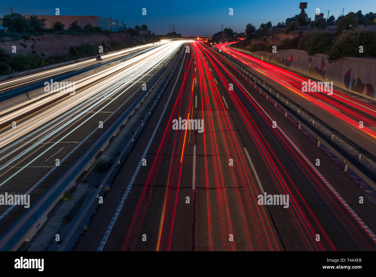 Light trails on the highway at night, urban landscape Stock Photo