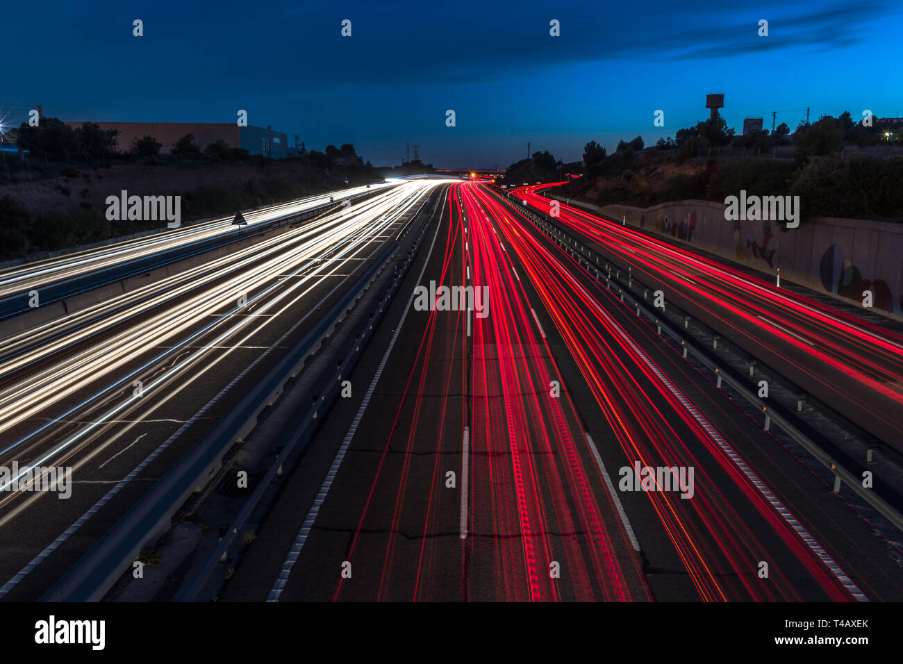 Light trails on the highway at night, urban landscape Stock Photo