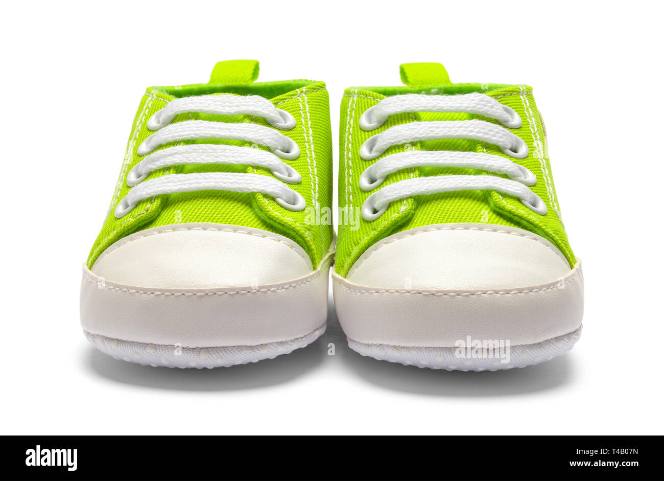 Pair Of Green Baby Shoes Front View Isolated on White Backround. Stock Photo
