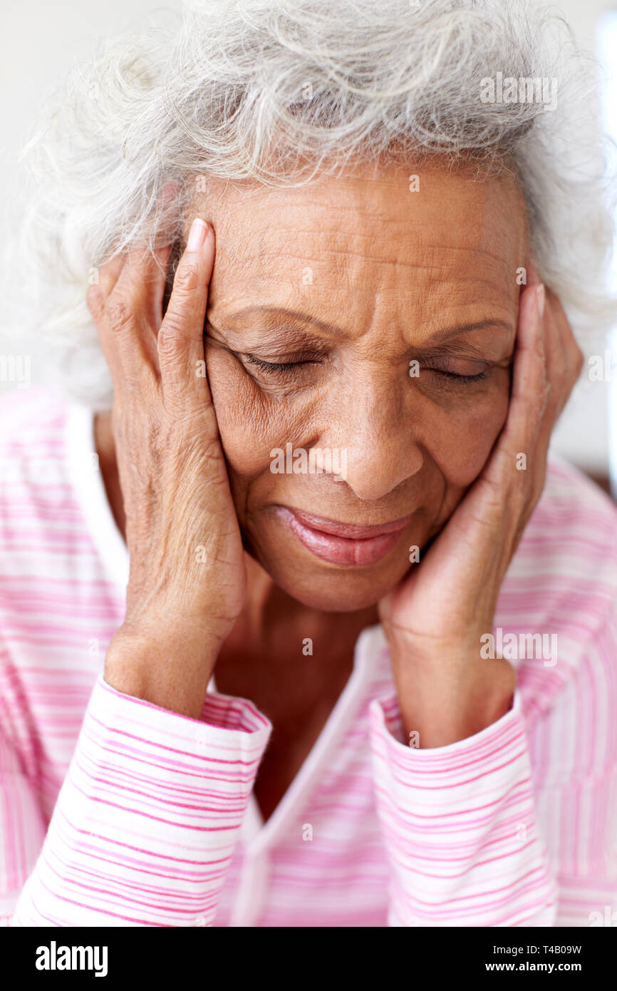 Woman head in hands bed hi-res stock photography and images - Alamy