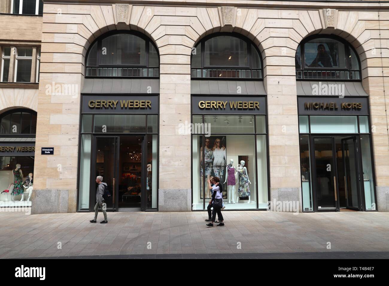 LEIPZIG, GERMANY - MAY 9, 2018: People walk by Gerry Weber and Michael Kors  at Grimmaische Street in Leipzig, Germany. Grimmaische Strasse is the hear  Stock Photo - Alamy