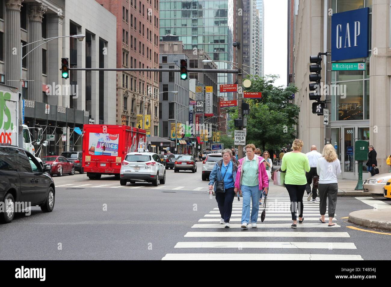 CHICAGO, USA - JUNE 26, 2013: People walk the famous Magnificent Mile of Michigan Avenue in Chicago. It is Chicago's major shopping destination and on Stock Photo