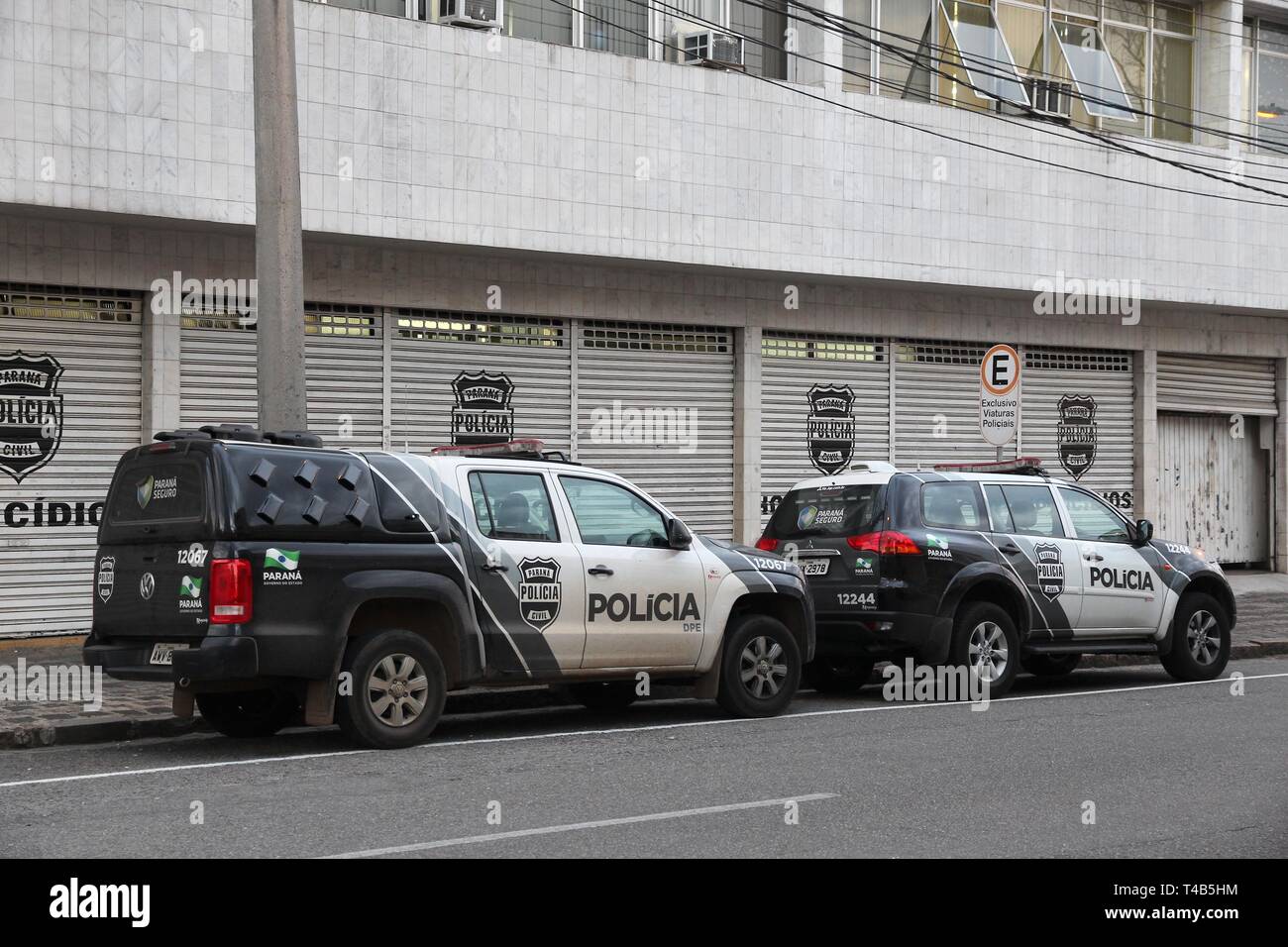 CURITIBA, BRAZIL - OCTOBER 8, 2014: Police cars of Parana region in Curitiba. Brazil has 424,000 police officers. Stock Photo
