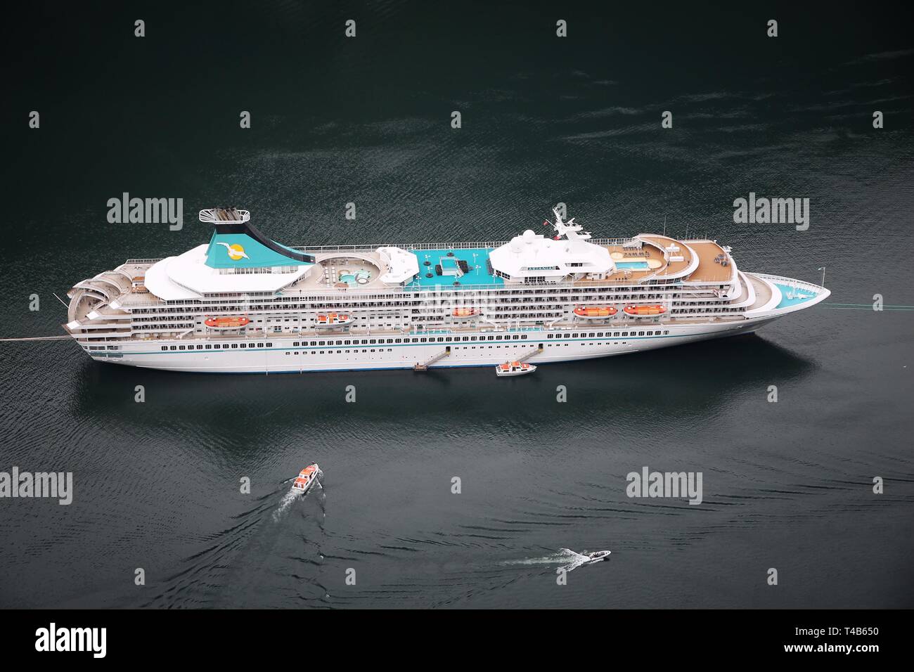 GEIRANGER, NORWAY - JULY 19, 2015: MV Artania cruise ship in Geiranger, Norway. The ship was made in Helsinki Shipyard by Wartsila. It is operated by  Stock Photo