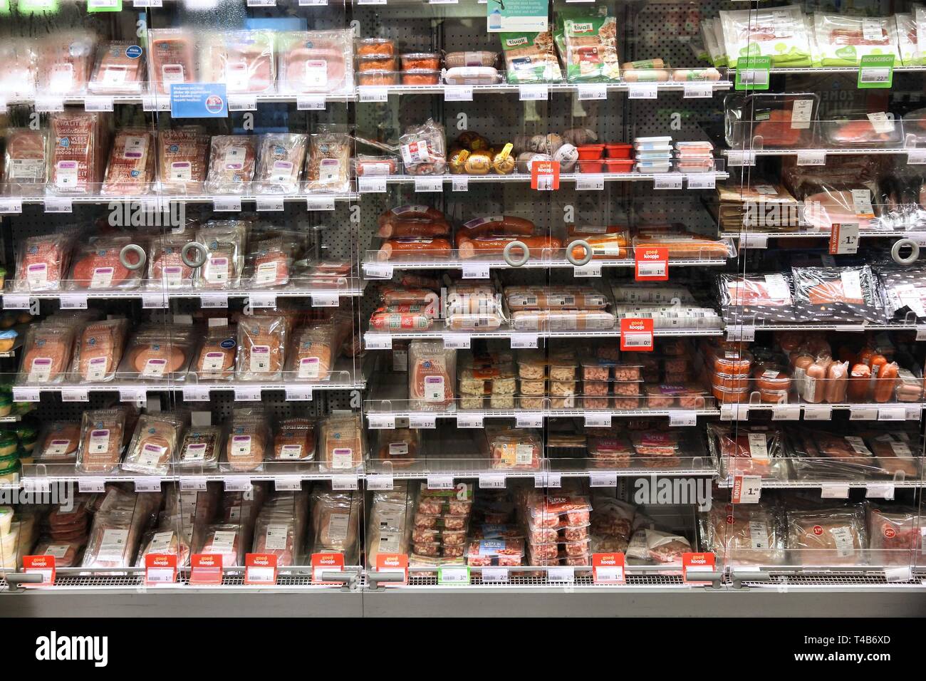 AMSTERDAM, NETHERLANDS - JULY 7, 2017: Refrigerator shelf at a supermarket in Amsterdam. Sales turnover of supermarkets in Netherlands has grown 32 pe Stock Photo