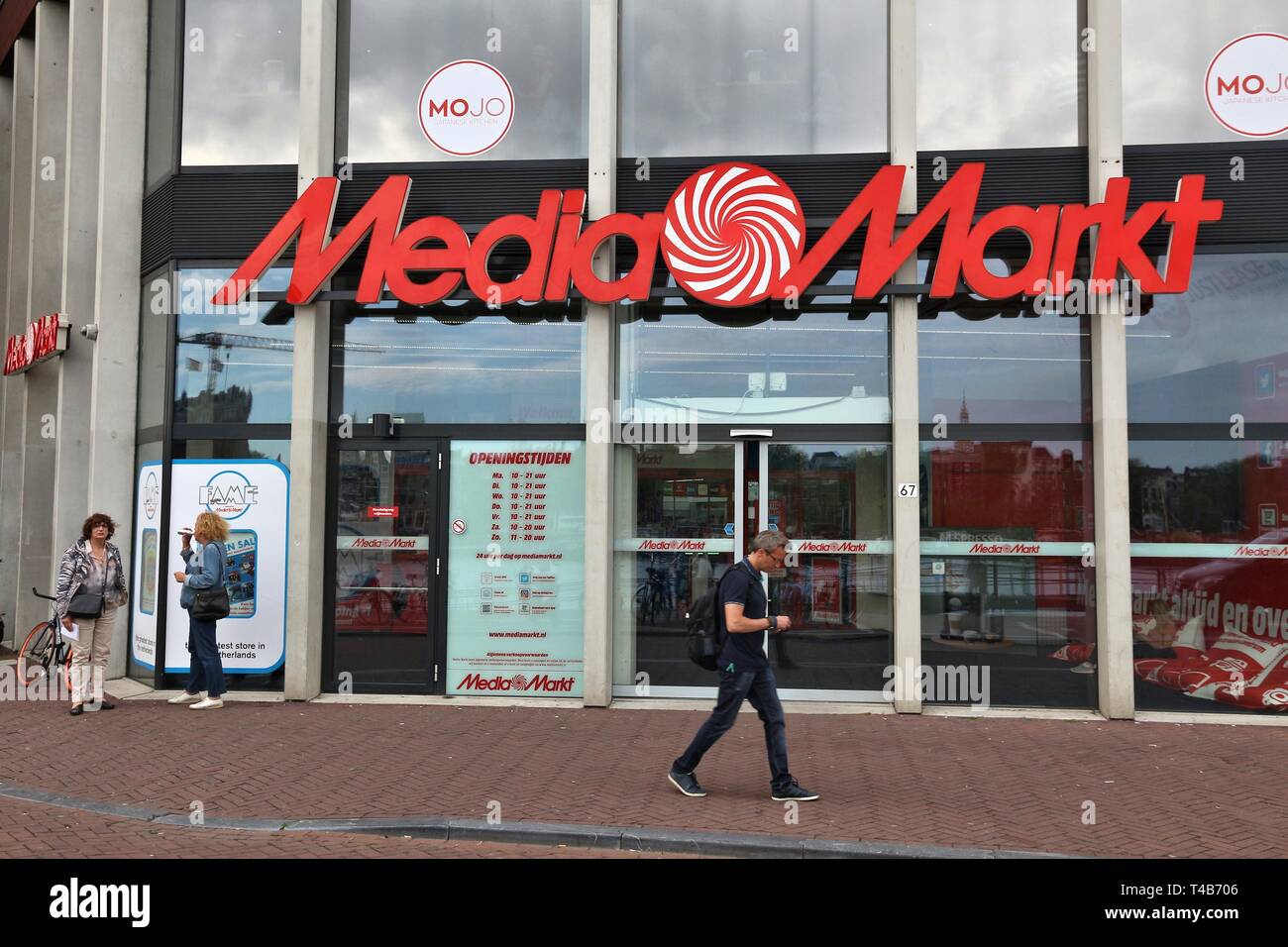 AMSTERDAM, NETHERLANDS - JULY 8, 2017: People walk by Media Markt store in  Amsterdam. Media Markt is the largest consumer electronics store chain in E  Stock Photo - Alamy