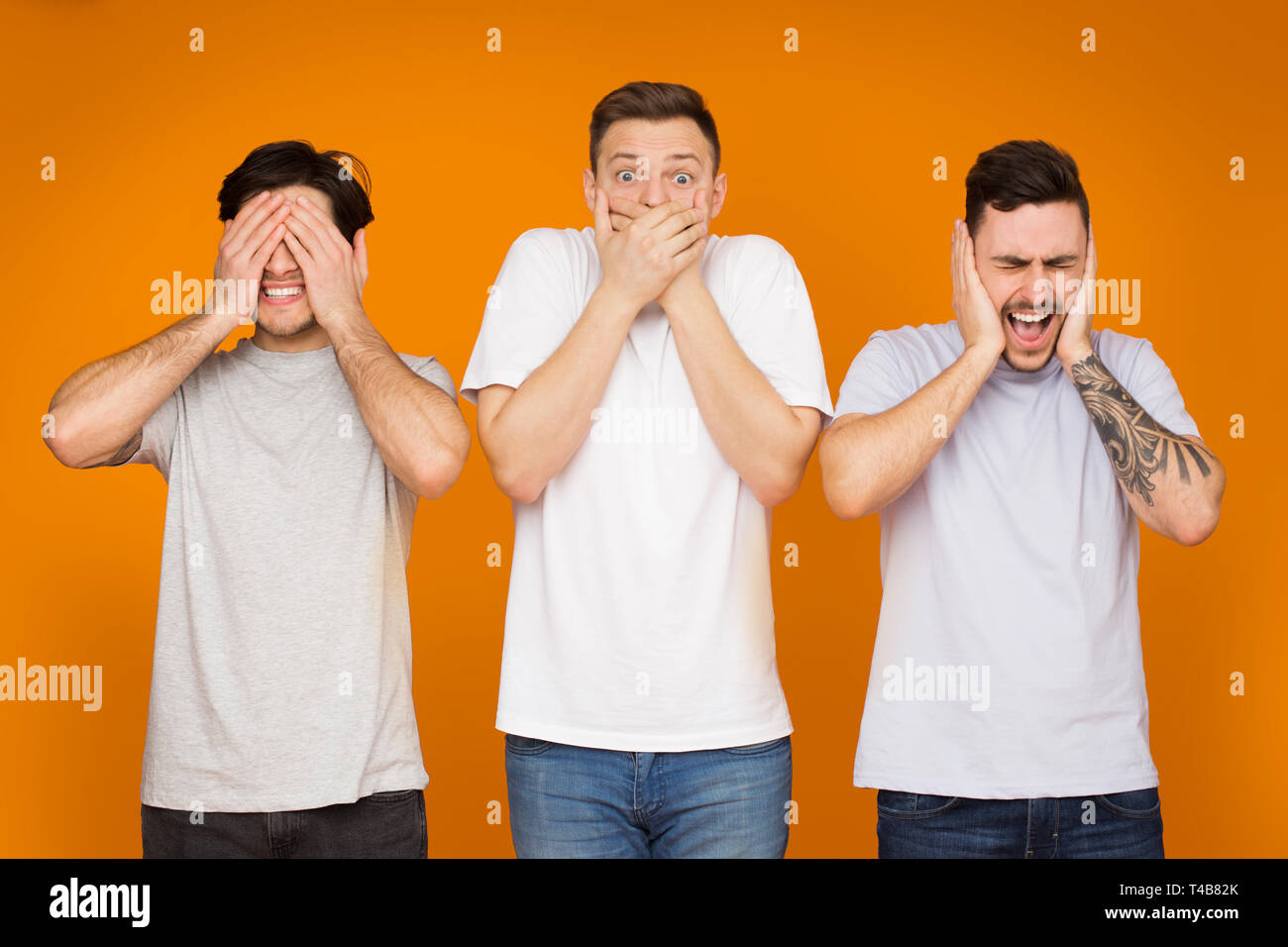 funny-men-covering-his-mouth-ears-and-eyes-T4B82K.jpg