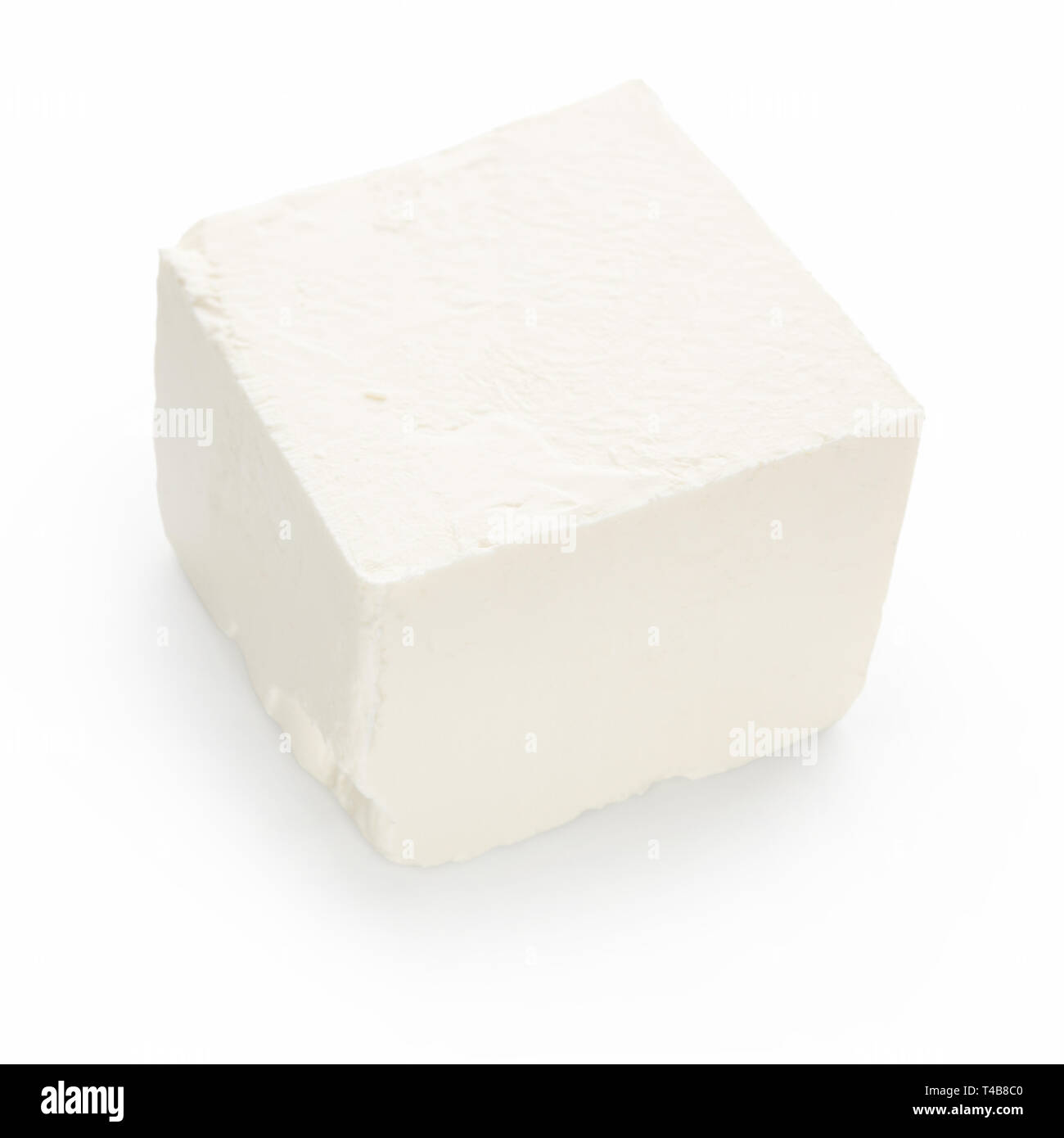 Feta cheese cube on white Stock Photo Alamy