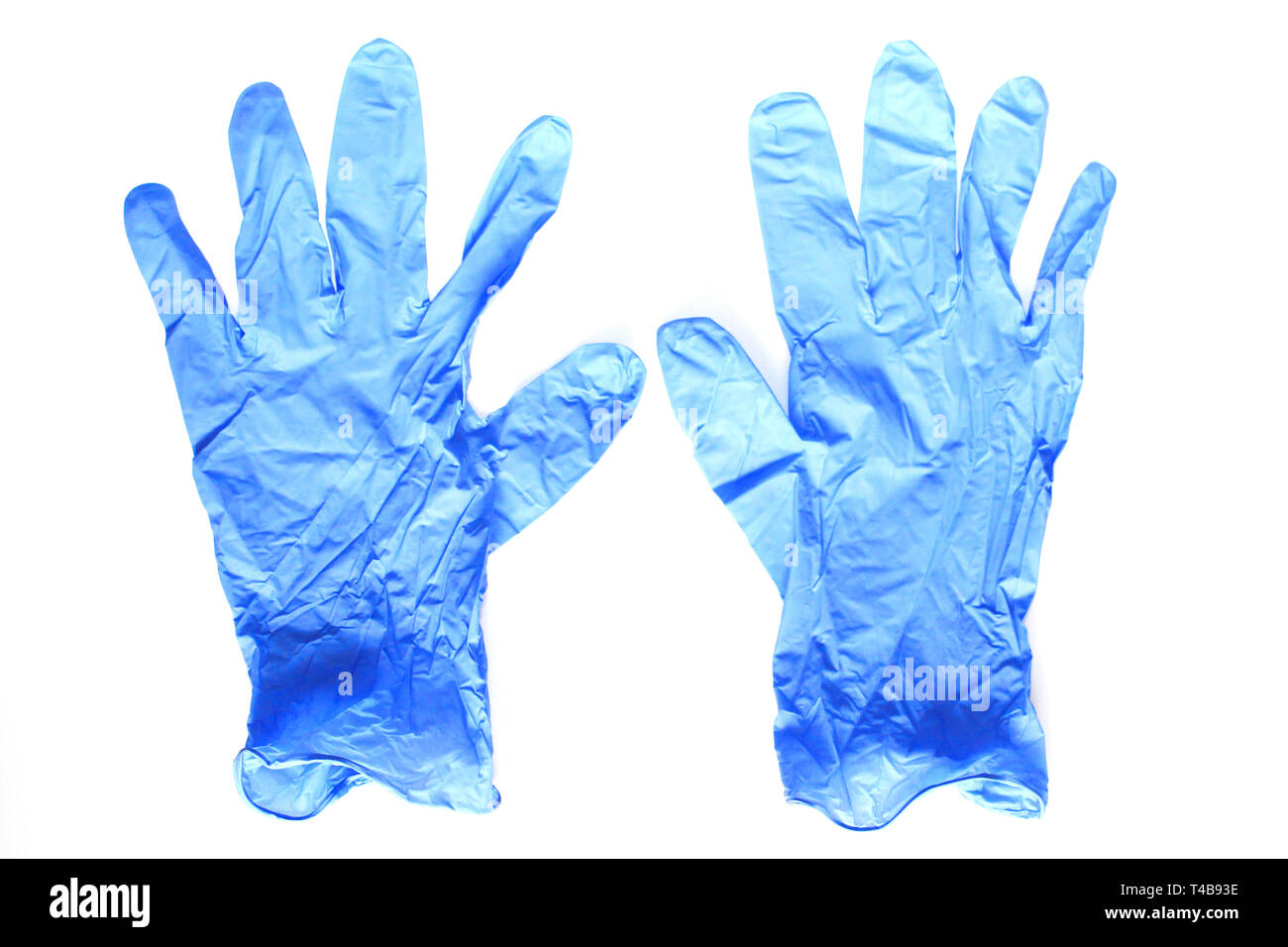 Blue medical gloves. Latex sterile gloves lie on a white background
