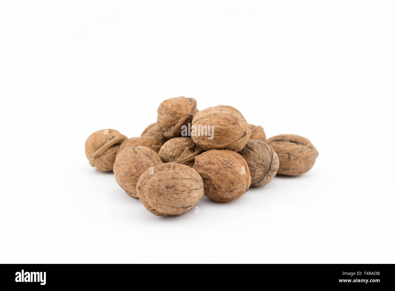 Walnuts on white background. The health benefits of walnuts ...