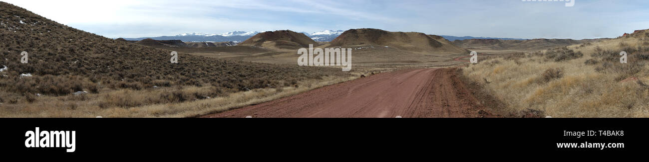 Panorama of the Bighorn mountain range from the Wyoming Great Plains with a Trail in the foreground. Stock Photo
