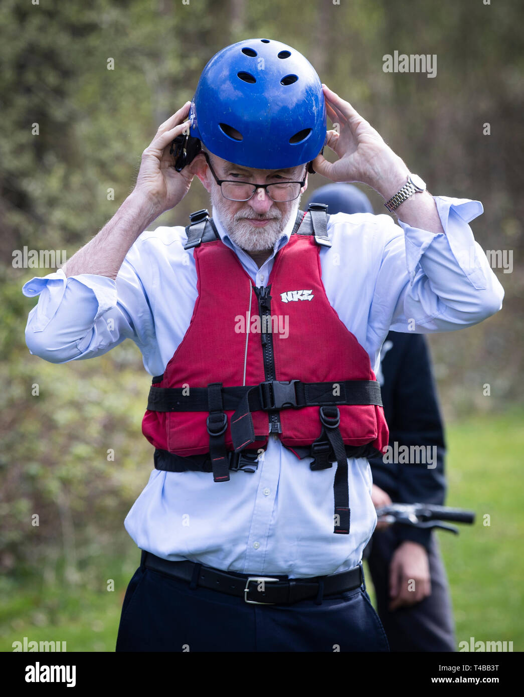 Labour Party leader Jeremy Corbyn puts on a helmet and life jacket