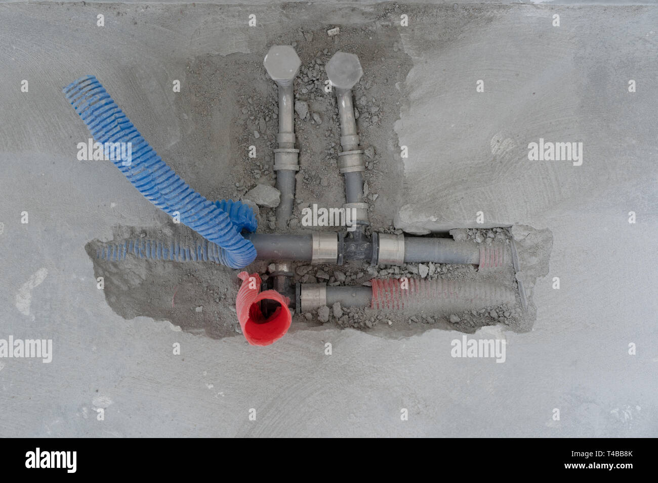 plumbing fixtures in the apartment - radiator pipes Stock Photo