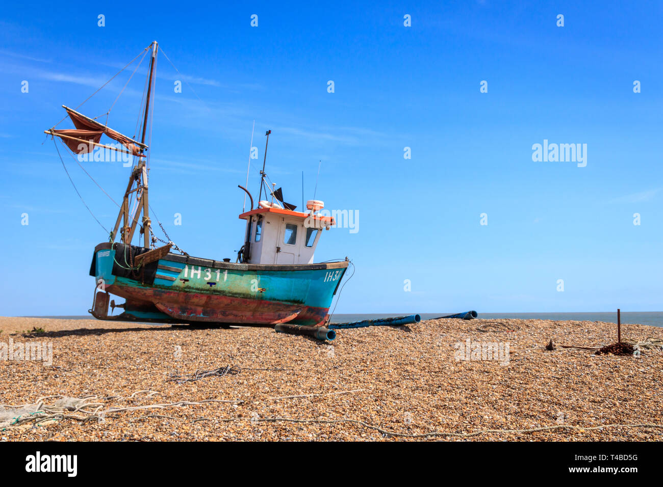 Fishing Boat on Aldeburgh Beach Suffolk East Anglia UK on a very sunny day Stock Photo