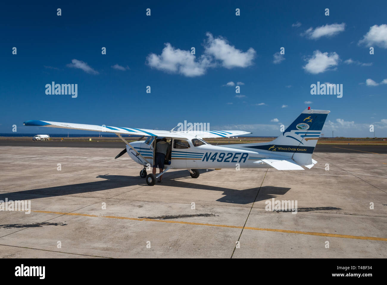 Lihue, HI, USA - November 1, 2016: A Cessna airplane of “Wings over Kauai” waiting for the next flight at Lihue airport Stock Photo