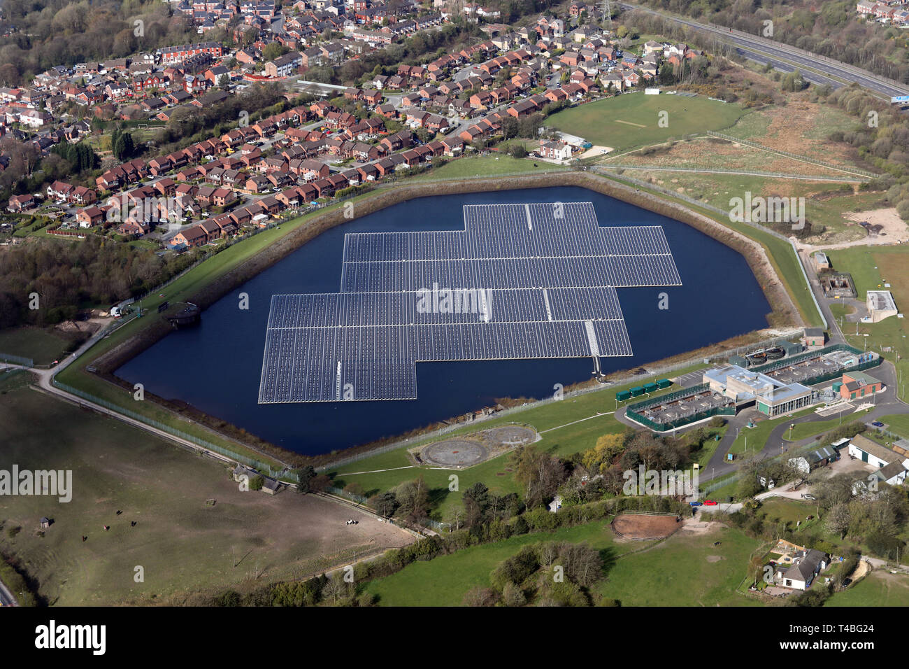 aerial view of a solar farm floating on Godley Reservoir, near Hyde, Cheshire Stock Photo