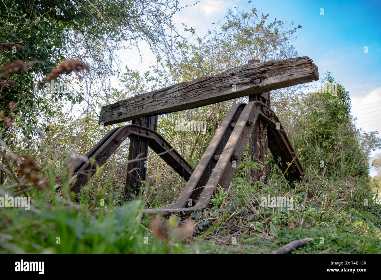 Wooden buffer stop next to Shoreham Cement Works on the Downs Link. Shoreham-by-Sea, Sussex. Stock Photo