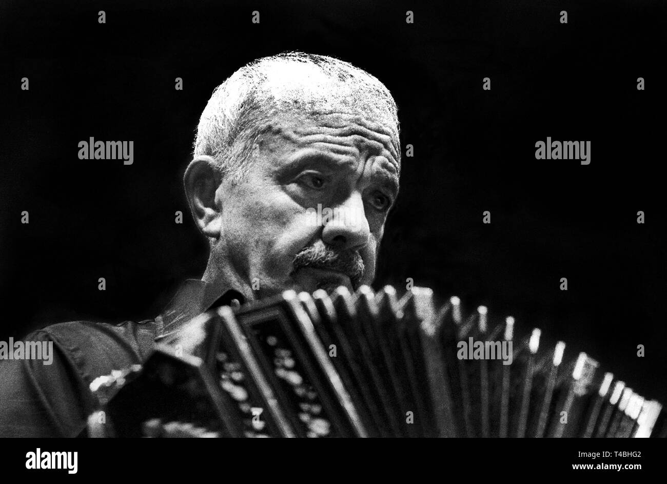 An undated picture shows Argentine tango composer and bandoneon player, Astor Piazzolla playing his bandoneon in Buenos Aires, Argentina. Piazzolla was born in Mar del Plata, Argentina in 1921, 90 years ago. His oeuvre revolutionized the traditional tango into a 'Nuevo Tango' incorporating elements from jazz and clasical music. Photo: Claudio Herdener/dpa | usage worldwide Stock Photo