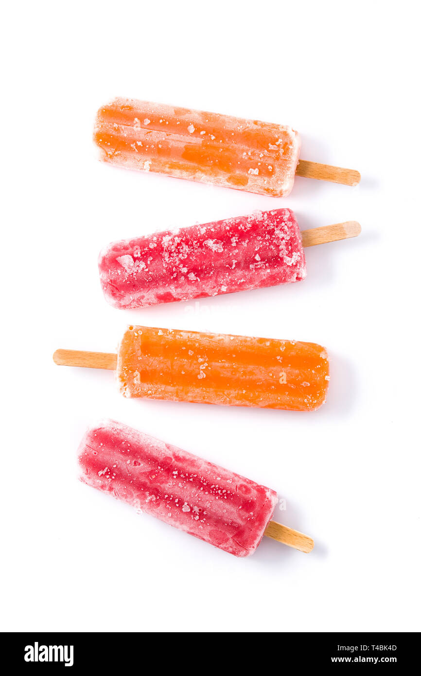 Orange and strawberry popsicles isolated on white background. Top view Stock Photo