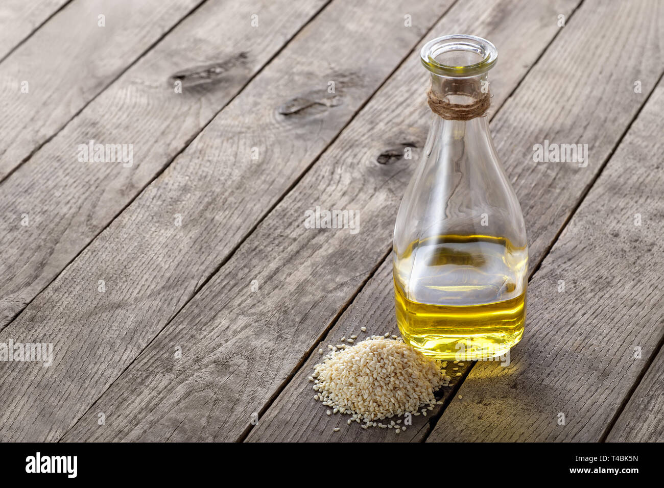 sesame oil in glass bottle Stock Photo Alamy